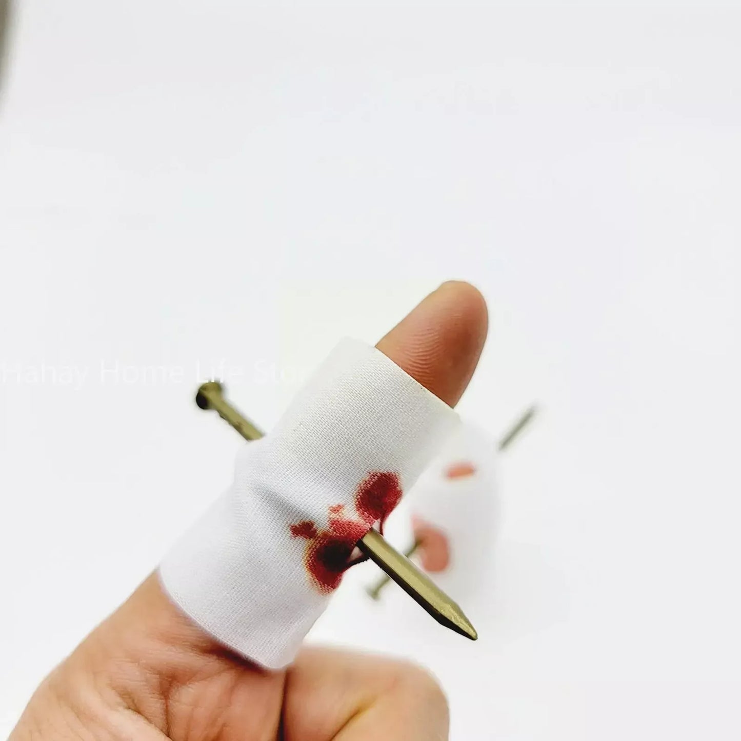 Fake Nail Through Finger Prank Toy